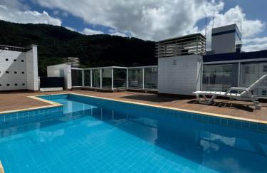 Apartamento na Praia das Toninhas em Ubatuba 350m da praia -2 quartos sendo 1 suite, piscina, varanda gourmet com churrasqueira, ar condicionado, cozinha completa, duas garagens - Foto 26