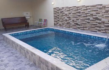 Casa Praiana - Piscina, churrasqueira, Wi-Fi, espaço amplo, garagem, lado praia - Foto 1