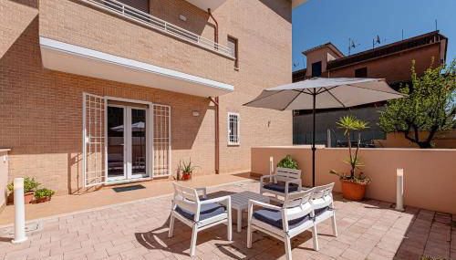 Ruggieri Apartments Roma - A 5 minuti dalla Metro A Anagnina - Foto 4, sunbed