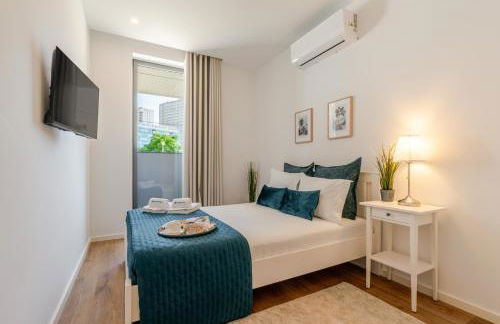 Sleek & Modern Flat w/ Private Garage by HostWise - Photo 2