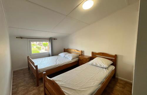 Domaine de vacances à 600m de la plage villa climatisée 3 chambres 7 couchages terrasse WIFI animations et piscines en supplément LRPDSD7 - Foto 9