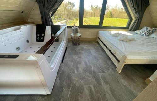 Osada Skoczkowo komfortowe domki z prywatnymi wannami hot-tub nad jeziorem- sauna- balia- prywatny staw wędkarski - Foto 23