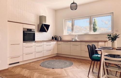 Modernes Apartment am See mit Terrasse - Photo 1