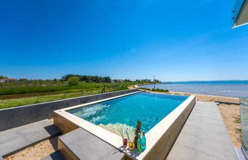 JamC Dream Familientraum direkt am Meer mit beheiztem Pool - Photo 22