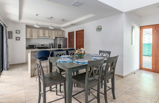 Ultramodern Townhome with an Inviting Coastal Design and Lush Outdoor Oasis with a Private Pool - Photo 13