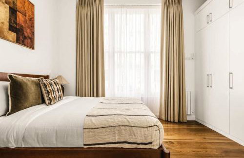 Elegant Kensington Apartment AC - Foto 13