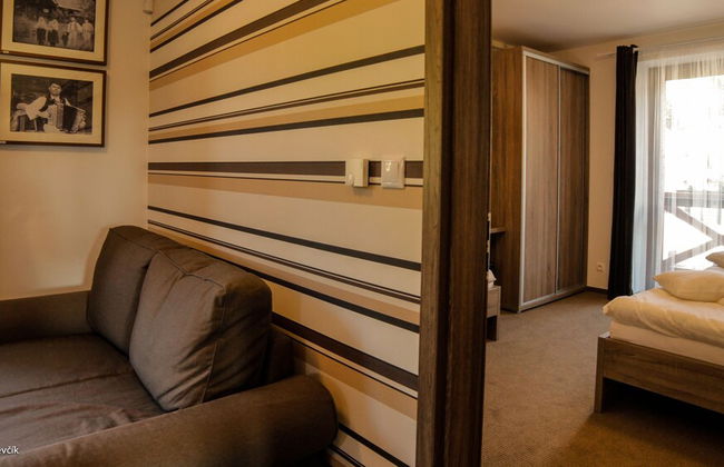 Mucha Apartments - Photo 3