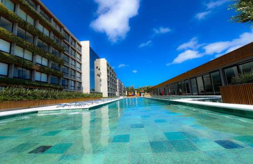 Resort com Piscina Aquecida e Garagem em Xangri-lá - Foto 12