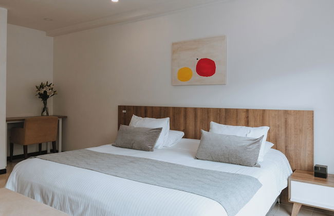 Travelers Orange Suites - Foto 11