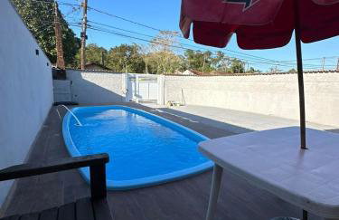 Casa com piscina em Itanhaem perto da praia - Foto 1