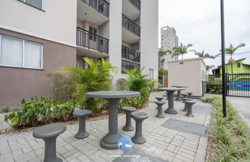 Apartamentos a 150 M DA PRAIA com SACADA, WI-FI, PISCINA, PORTARIA 24h, PLAYGROUND e vaga de GARAGEM - Foto 18