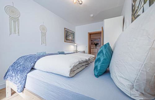 Gemütliche Ferienwohnung mit 2 Schlafzimmern, kostenfreiem Parkplatz, modernem Bad, Küche, Waschmaschine & Trockner - Foto 13