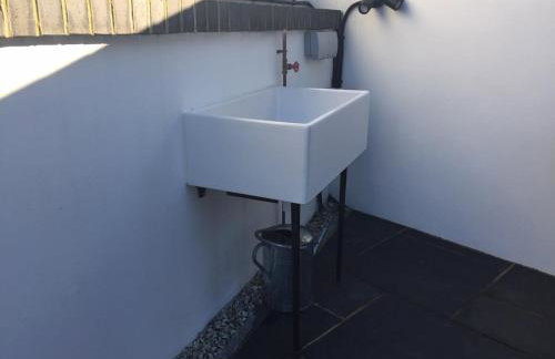 Relax in style at my stunning Holywell Beach home - Foto 15