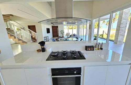 Piscina aquecida, 5 suítes e pé na areia com vista espetacular!! - Photo 38