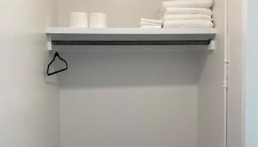 Innovative Studio Apartment - Photo 3, towels, wardrobe