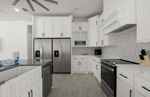 Brand NEW Expansive Coastal Home w/ Custom Furnishings Sleeps 15 - Photo 96