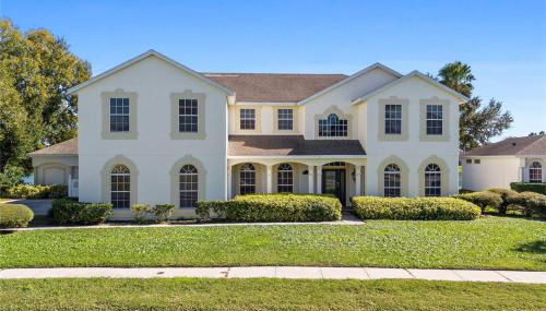 BRAND NEW! Lakefront 9BR Pool Hot Tub Outdoor Kitchen BBQ Theater 2 miles Disney - Foto 5