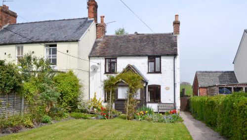 Honeysuckle Cottage - Foto 1