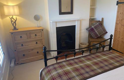 A charming and stylish country cottage. - Foto 18