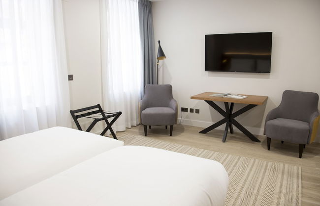 Prisma Suites - Photo 2