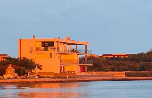 JamC Dream Familientraum direkt am Meer mit beheiztem Pool - Photo 7