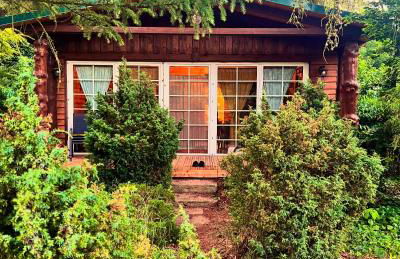 Holzhaus Bärenhöhle am Wald und See - Photo 1