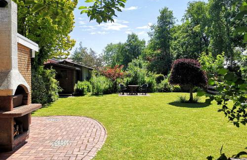 Haus Meereswind Esens, Wintergarten mit Kamin - Foto 8