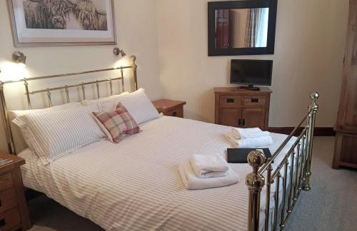 The Snug a cosy, quirky detached cottage with sea views - Foto 3