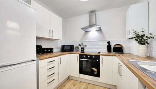 Balfour House - Air Host & Stay - Sleeps 8, free parking - Foto 5, stove