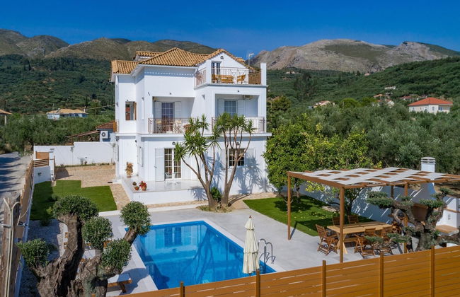 Villa Status - Foto 1