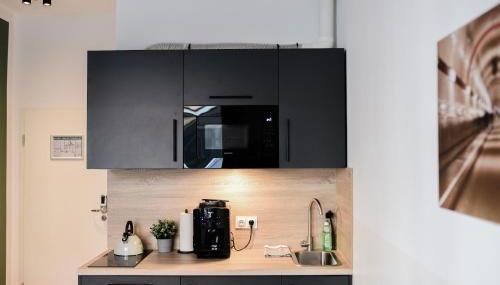 Homaris Apartments Elmshorn - Foto 3, minibar