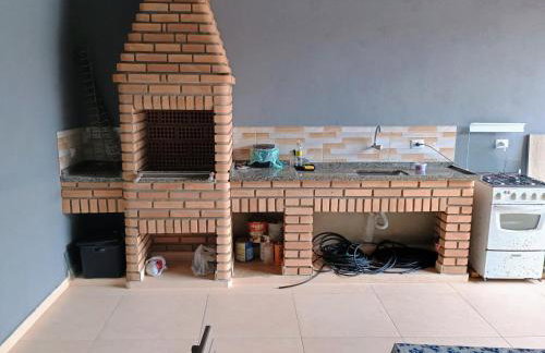 Casa aconchegante com churrasqueira e piscina para um ambiente familiar - Photo 4