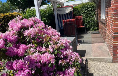 Wohnung 1 mit überdachte Terrasse zum Garten Nähe Strand und Hafen Bensersiel - Foto 5