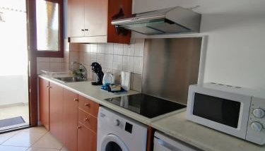 Agapi Studio Acharavi à 50m de la mer, 400m du centre ville - Foto 3, stove