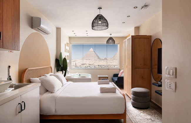 Xuru Stays I Jacuzzi Studios @ The Pyramids - Foto 12