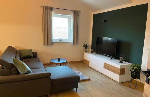 Neue moderne Ferienwohnung mit Infrarot Sauna und großen Garten - Foto 1