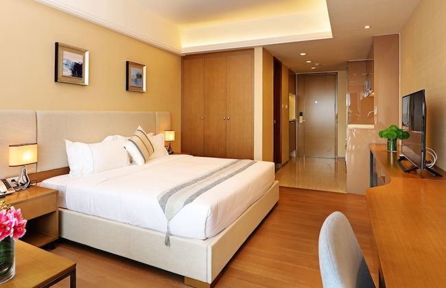 Yuwa Serviced ApartHotel - Photo 6