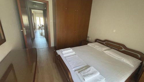 Cozy Apartment in Ptolemaida - Foto 5, towels, wardrobe