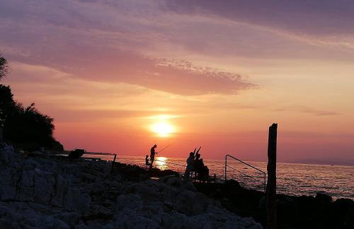 Sunset by the sea - Photo 3