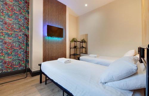 Newcastle CITY APT35,FREE STREET PARKING,4 BEDROOM HOUSE,8 SINGLE BEDS,FULL KITCHEN,ALL ROOMS WITH TVs,NETFLIX - Photo 24