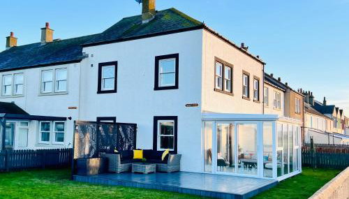 Sunset House On The Beach - Foto 1, Garden view