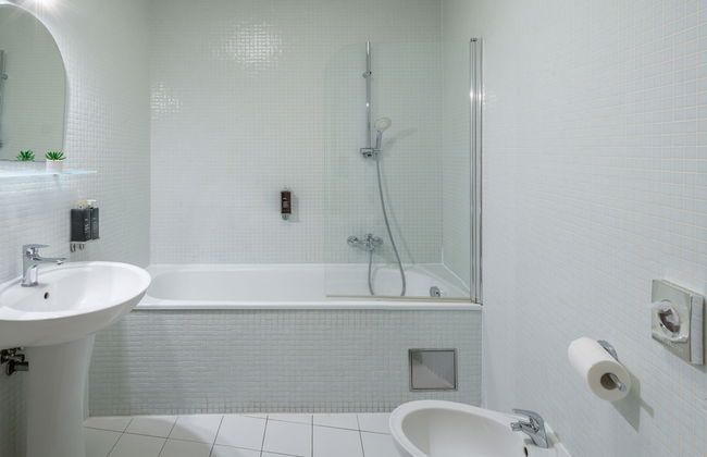 6 Continents Apartments by Adrez Living - Photo 29