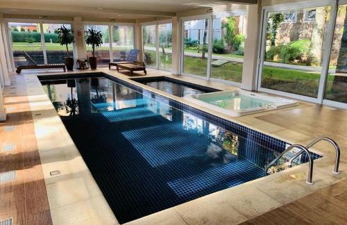 Casa de Pedra 303A - 2 suítes com piscina Gramado - Foto 5