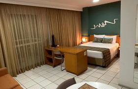 Praia do Canto Apart Hotel quarto sala e varanda - Foto 4