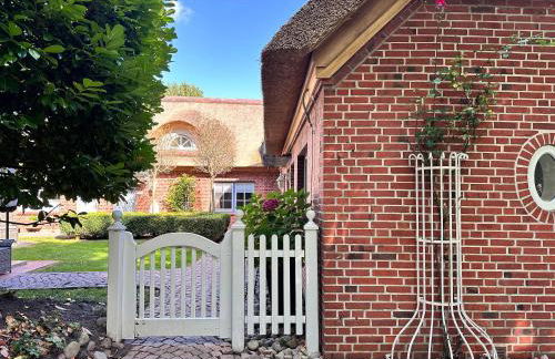 Sky & Sand Homes Sturmmöwe I Reetdach-Refugium mit Parkgarten in SPO - Photo 5
