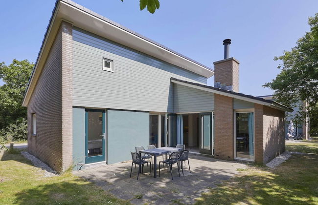 Cozy Beachside Retreat With Fireplace - Photo 1