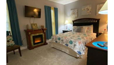 First Class Treatment Luxurious end unit Patio Pool Restaurant Bar on premises Steps away from Everything else! Spacious Condo Stocked with all You Need! - Foto 1