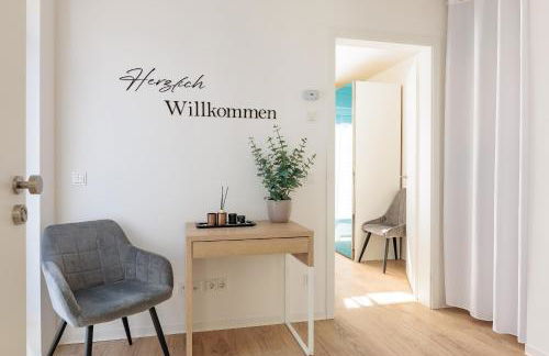 Modernes Apartment mit Terrasse & Garten, Parkplatz & 24h Self-Check-in - Foto 7
