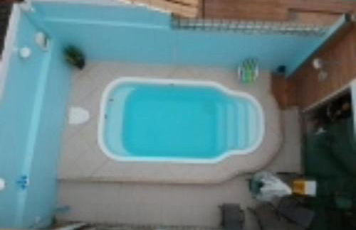 Casa Piscina em Condomínio 5min Praia ITACOATIARA. - Foto 10