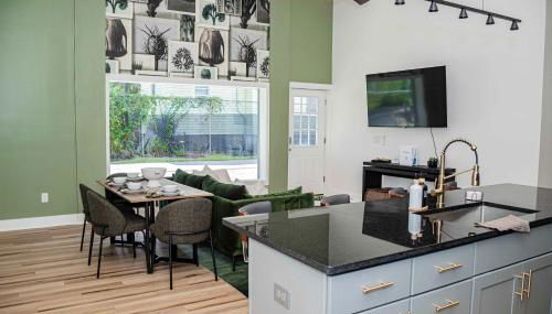 Urban Oasis - A Newly Renovated 4BR Dream - Photo 3